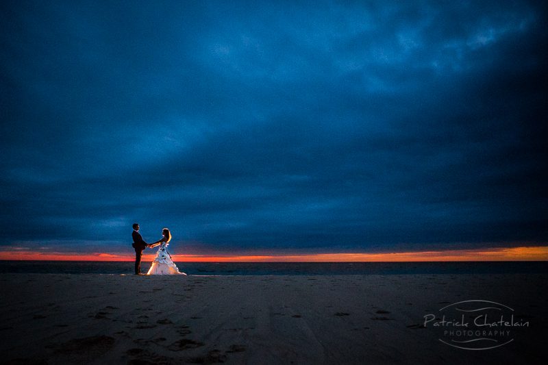NIGHT IMAGE OF A COUPLE BY THE OCEAN NEAR BORDEAUX, FRANCE